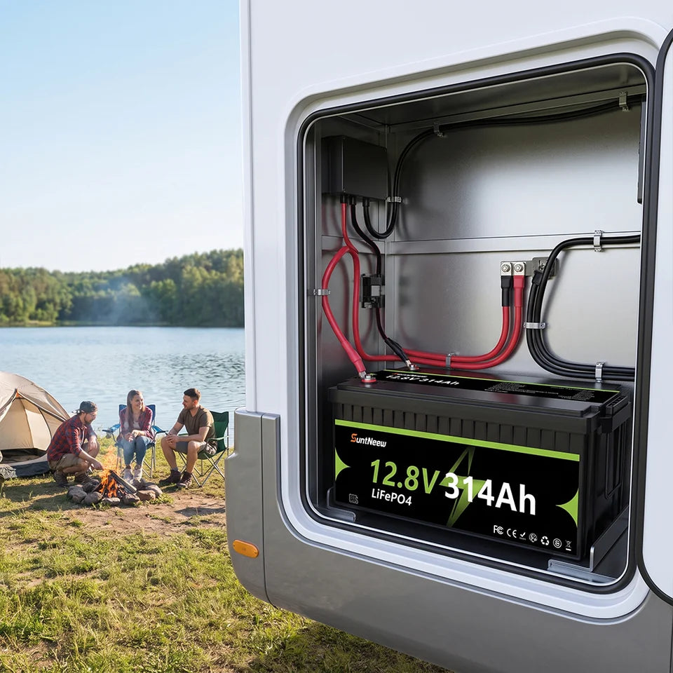SuntNeew 314Ah LiFePO4 RV battery installed in an RV service bay during overcast low-solar conditions